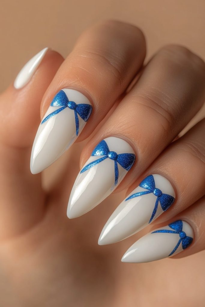 6 White Nails with Blue Bow with Blue bow outline
